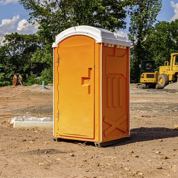 what is the cost difference between standard and deluxe portable toilet rentals in McNab